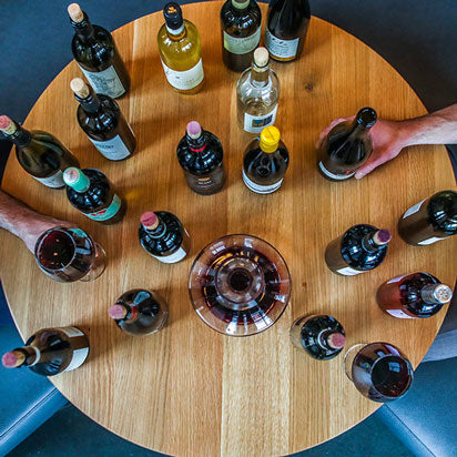 bottles of wine around a table